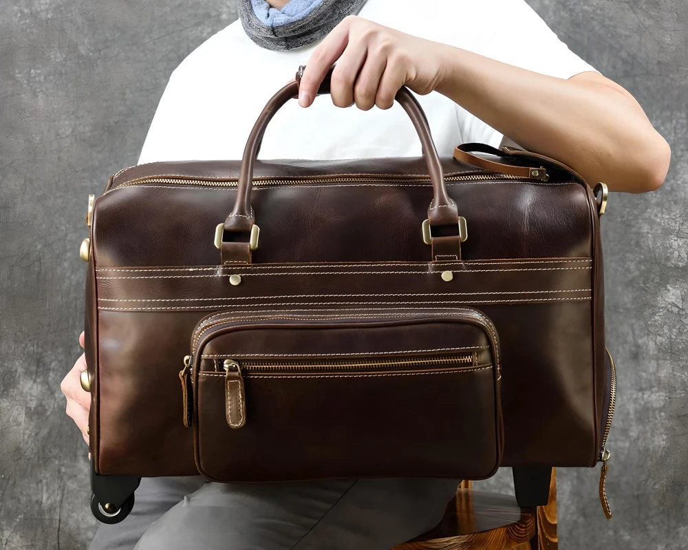 brown leather carry on bag
